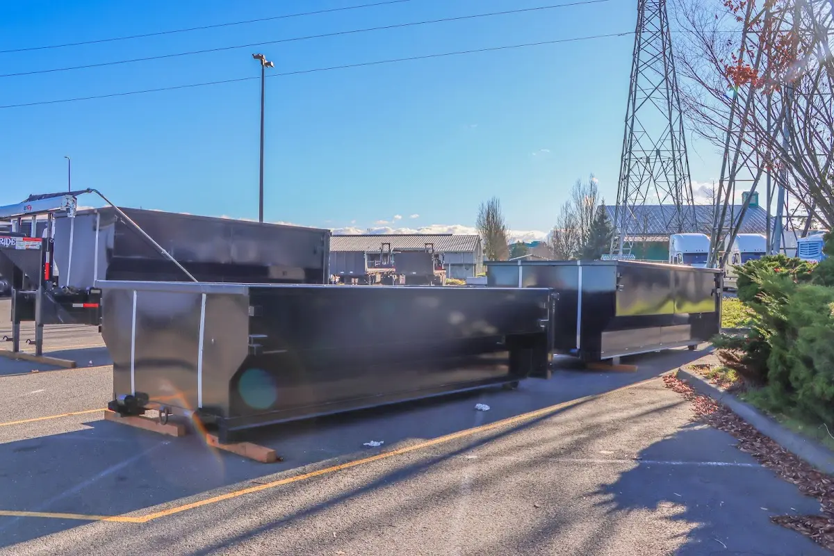 Roll-off dumpster ready for waste disposal at job site for 4 Yard Dumpster Rental in Wollochet
